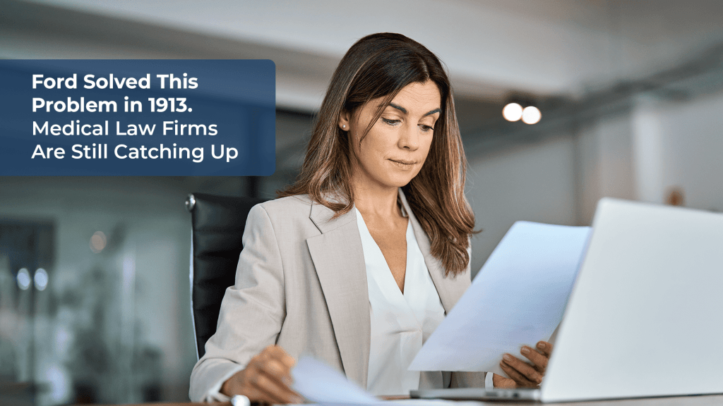 Attorney at a medical law firm reviewing case files with support staff while a nearshore legal virtual assistant