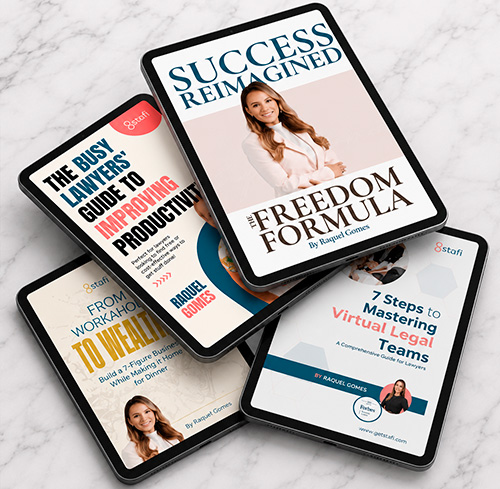 Stacked tablet mockup displaying multiple Stafi and Raquel Gomes ebook covers, featuring “The Freedom Formula” prominently in the foreground with additional legal and productivity-themed ebooks layered in the background on a marble surface.
